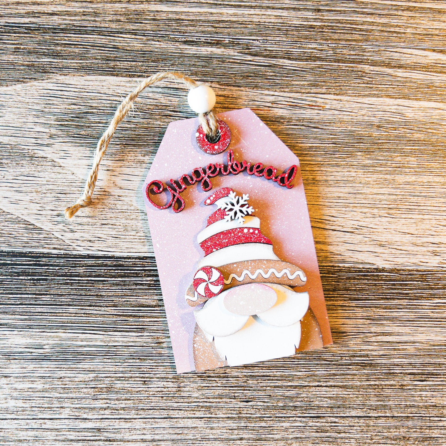 hand-painted Gingerbread Gnome tag ornament with peppermint and sparkle detail - Millie & Co.