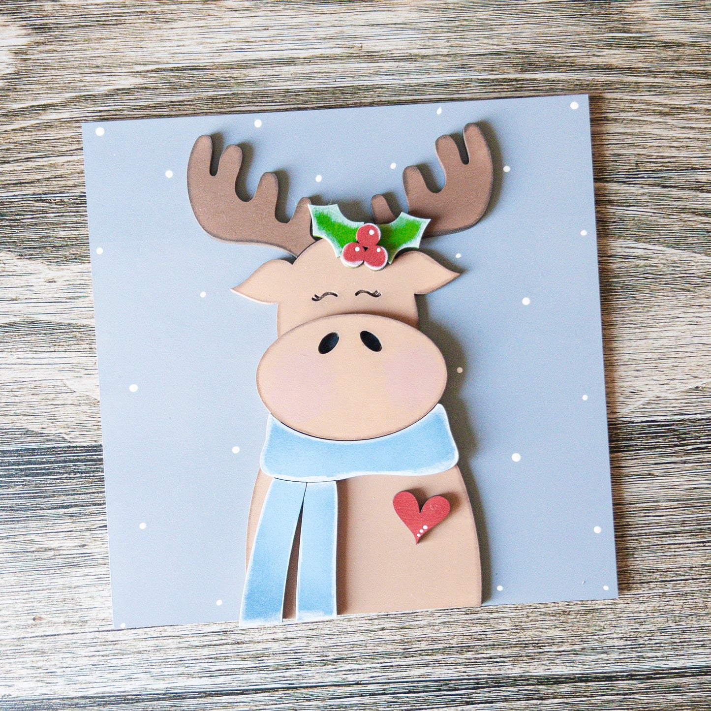 hand-painted interchangeable winter tile featuring a moose with a scarf - Millie & Co.