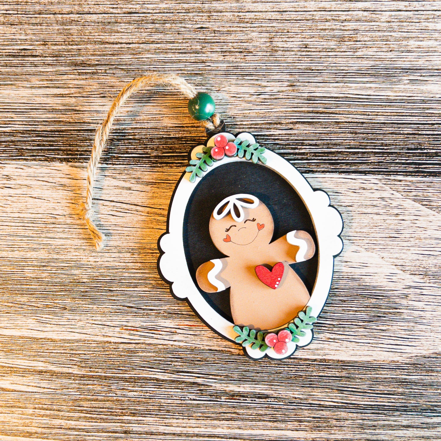 hand-painted vintage cameo gingerbread ornament framed in holly - Millie & Co.