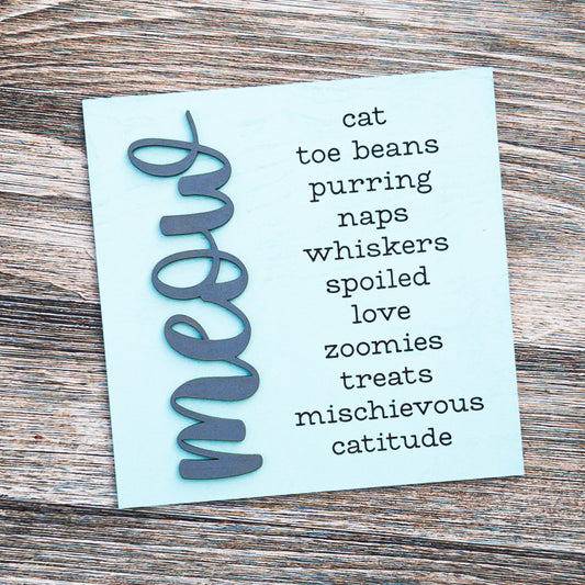 Cat lover porch decor tile in aqua with raised gray meow script and a list of cat favorites, Millie & Co.