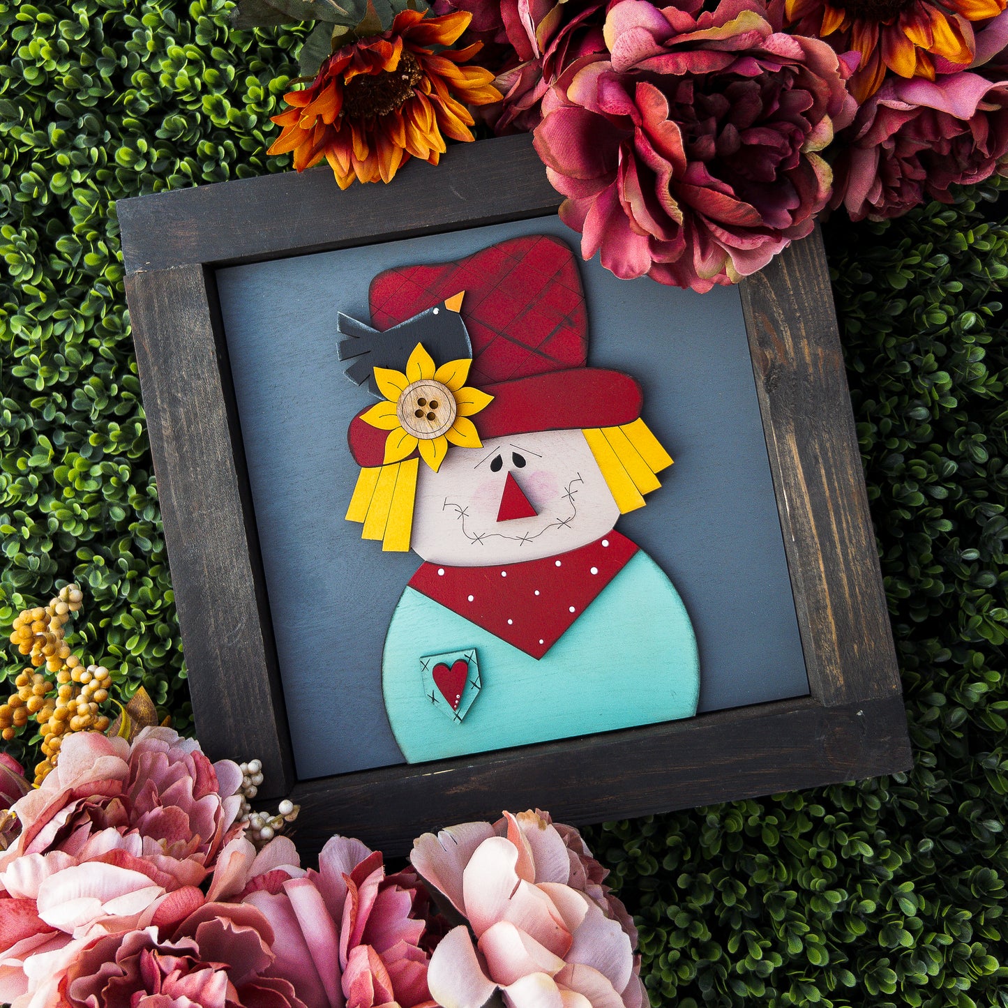 Fall porch decor tile with a stitched-face scarecrow, sunflower hat, and blackbird | Millie & Co.