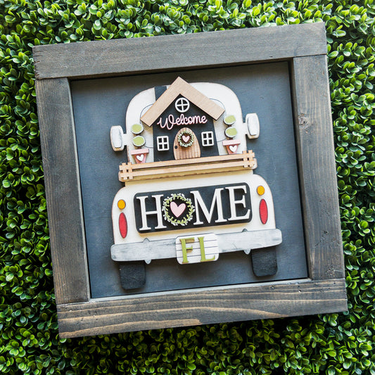Interchangeable porch decor tile of a vintage truck carrying a Welcome cottage with Home on the tailgate | Millie & Co.
