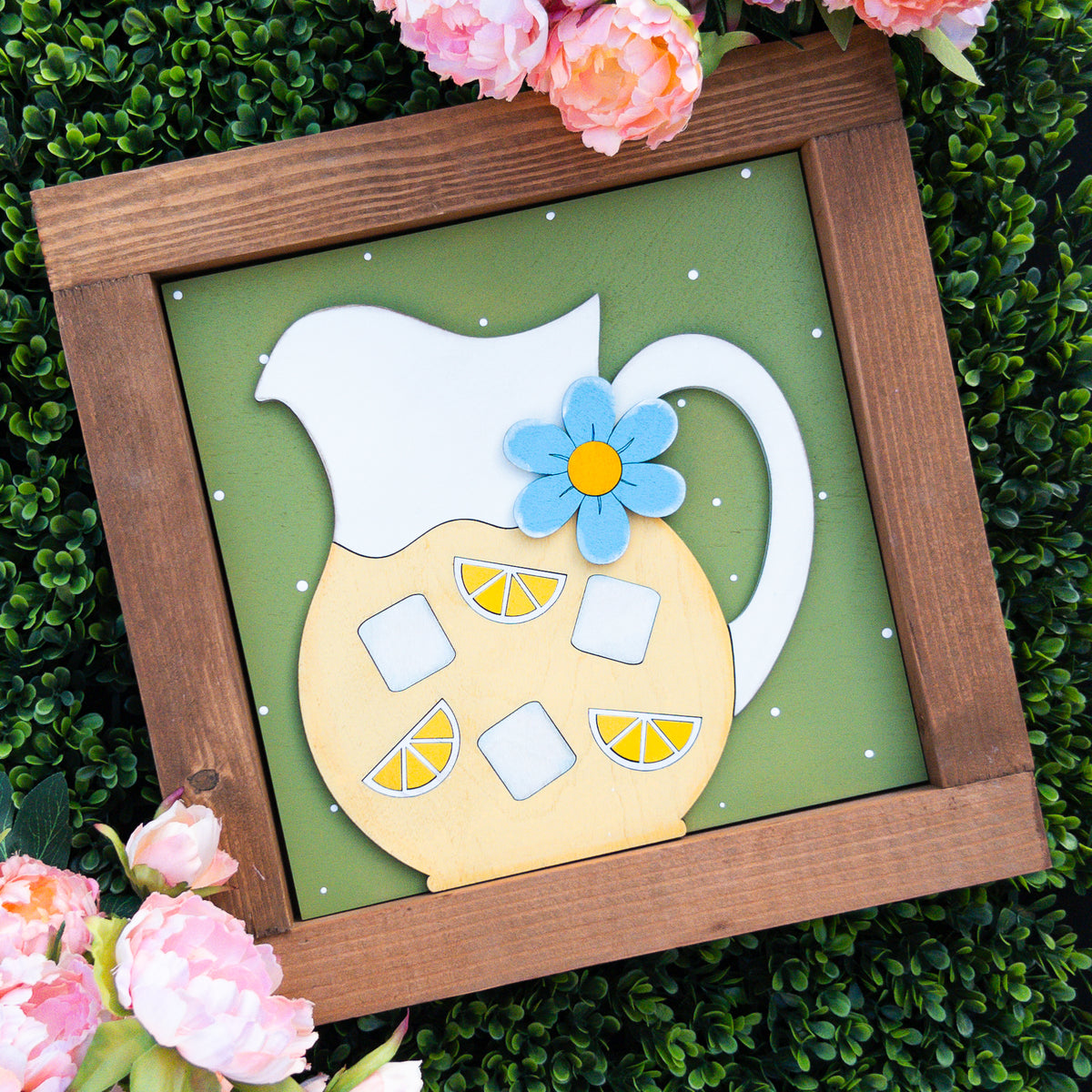 Lemon porch decor tile with a white pitcher of lemonade, ice cubes, and a blue daisy on sage green, Millie & Co.