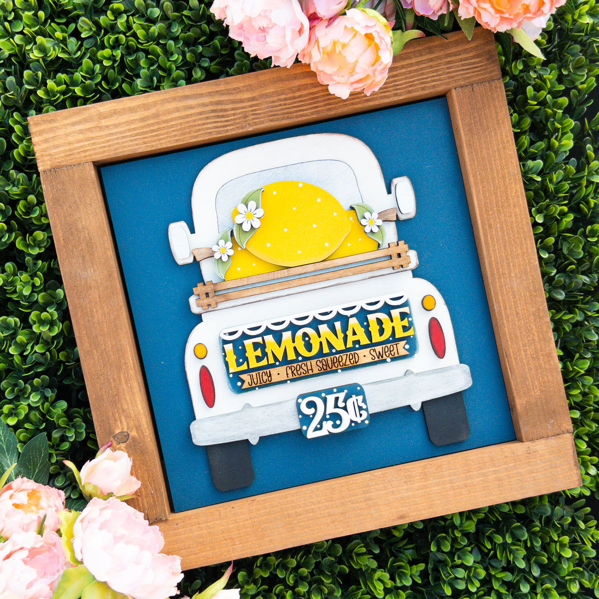Lemon porch decor tile with a white truck carrying giant lemons and a LEMONADE 25 cent sign on navy, Millie & Co.
