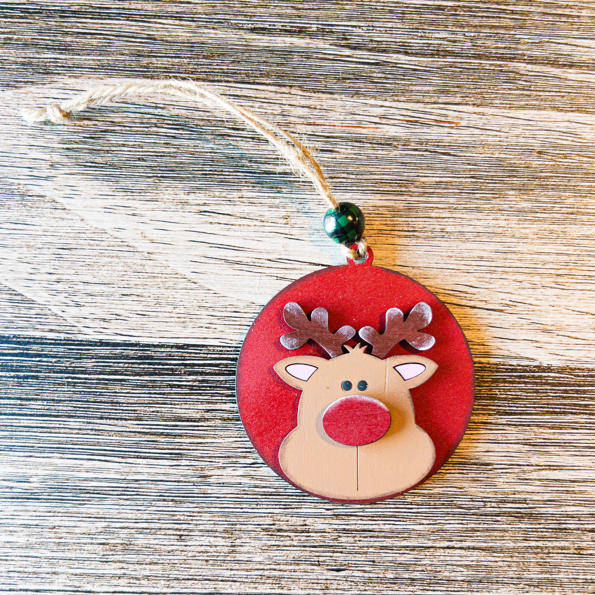 hand-painted round Rudolph ornament with red nose - Millie & Co.
