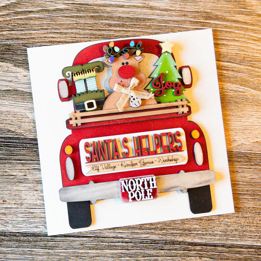 hand-painted interchangeable Christmas truck tile with Santa's helpers and reindeer - Millie & Co.