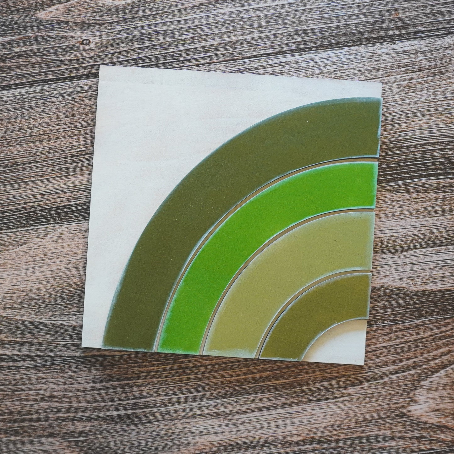 hand-painted interchangeable St. Patrick's tile with layered green rainbow design - Millie & Co.