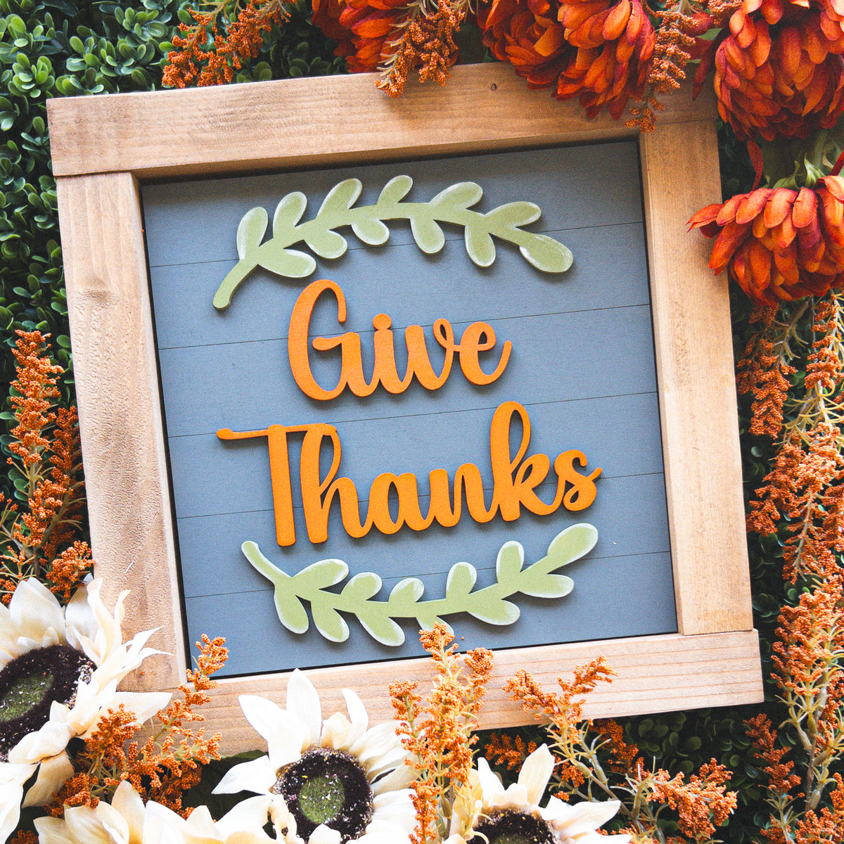 Interchangeable Thanksgiving porch decor tile reading Give Thanks with olive branch accents in a stained wood frame | Millie & Co.