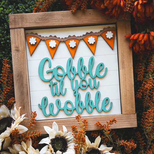 Interchangeable Thanksgiving porch decor tile reading Gobble Til You Wobble with a mini pie banner in a stained wood frame | Millie & Co.