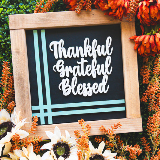 Interchangeable Thanksgiving porch decor tile reading Thankful Grateful Blessed in layered script in a stained wood frame | Millie & Co.