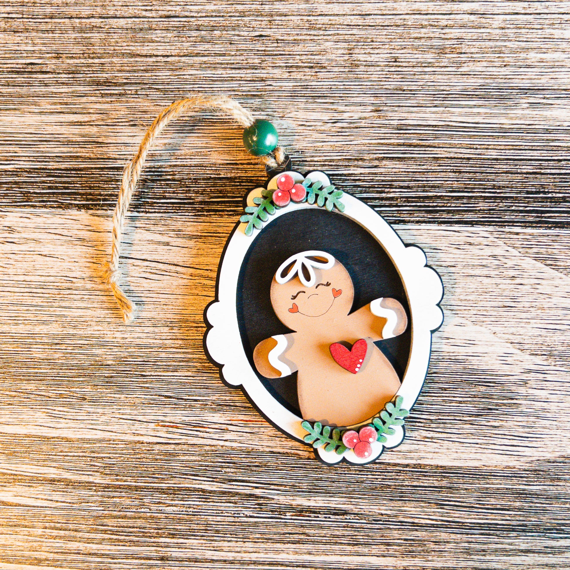hand-painted vintage cameo gingerbread ornament framed in holly - Millie & Co.