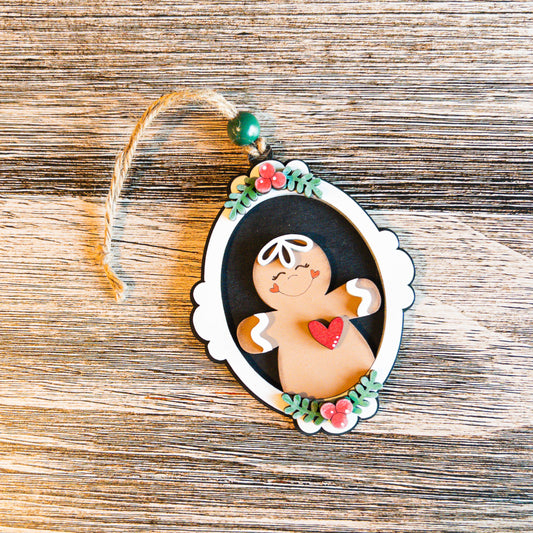 hand-painted vintage cameo gingerbread ornament framed in holly - Millie & Co.